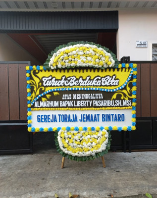 Papan Bunga Duka di Pancuran Dewa