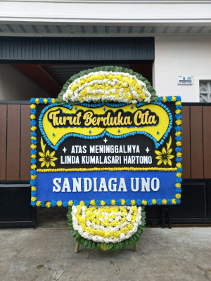 Papan Bunga Duka di Pancuran Dewa